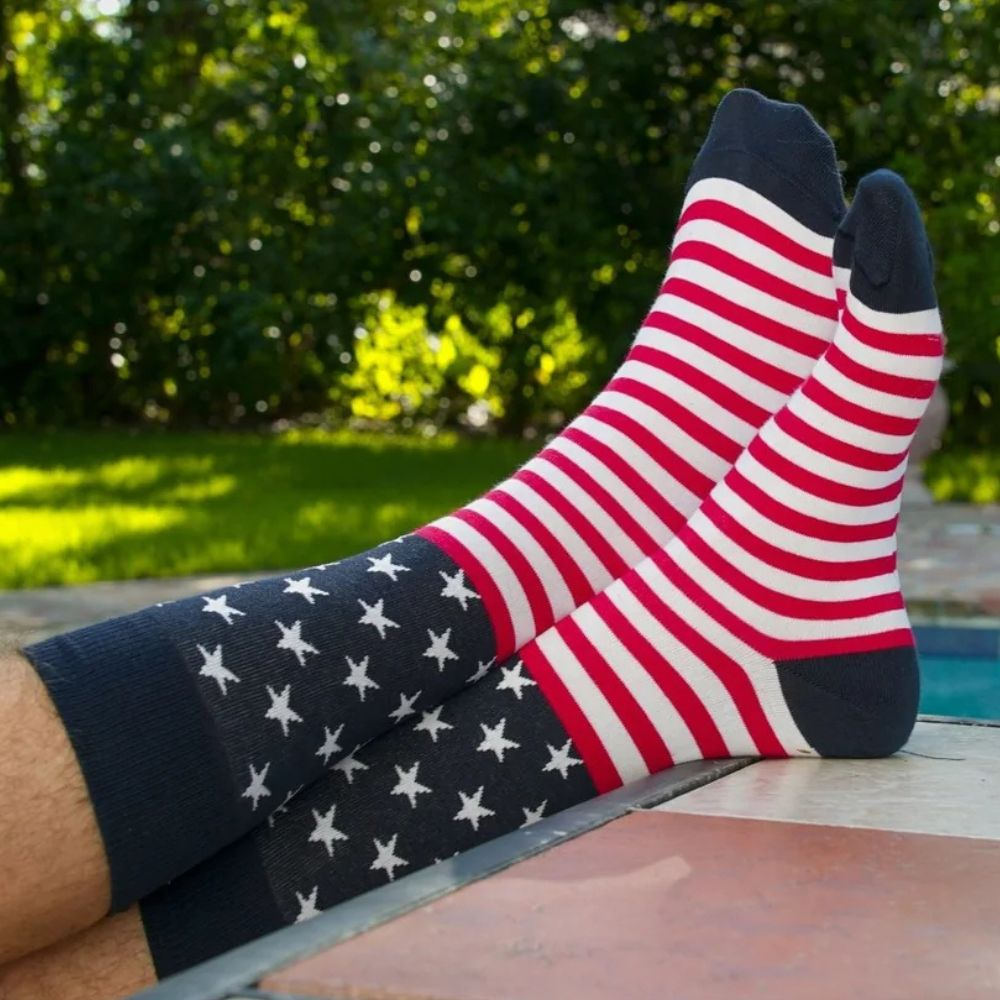 Patrotic socks on a person's feet from Ell & Atty